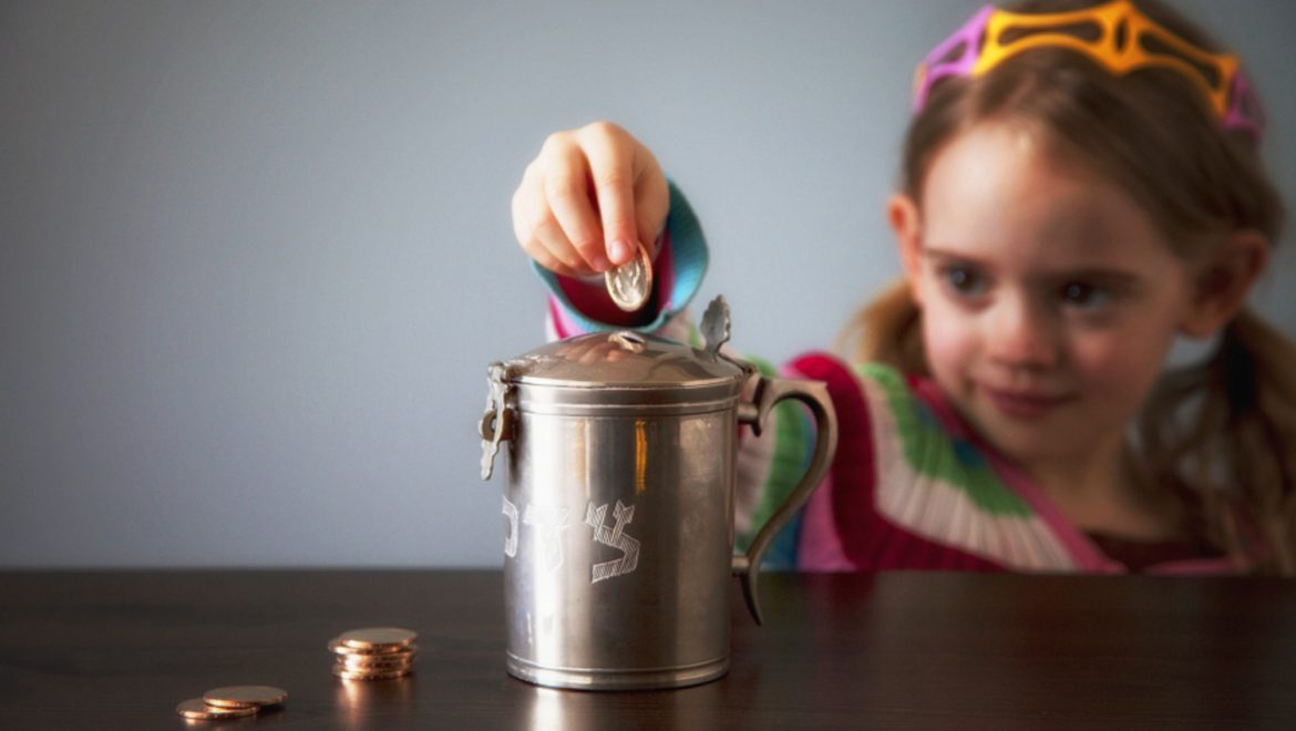 The Connection Between Giving Tzedakah and Shabbat Candle Lighting